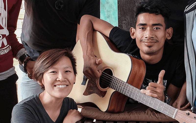 Meet Grace (left), our storyteller from Singapore, who told the story of Sophanna (right), and his relentless pursuit of music to inspire others.
